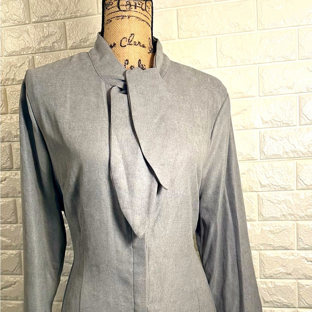 Midi long sleeve shirt dress with hidden buttons.